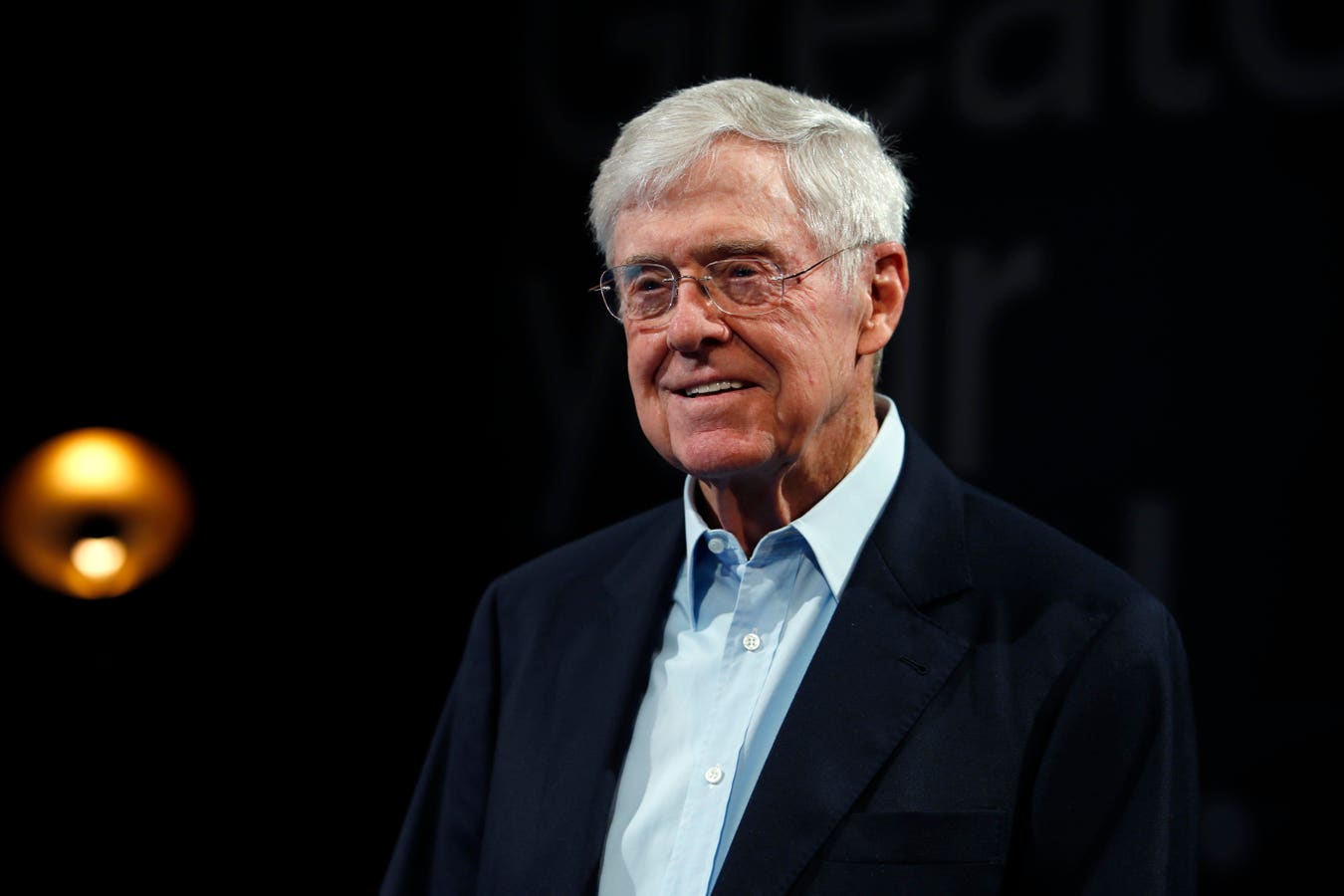 Protestors Rush Stage During Billionaire Charles Koch’s Award Speech